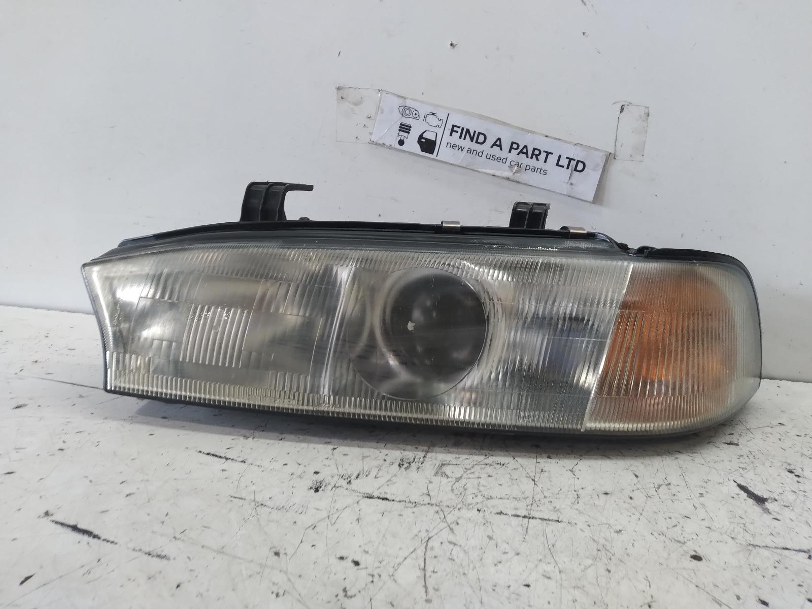 1996 SUBARU LIBERTY Left Headlamp Contact us for Photo