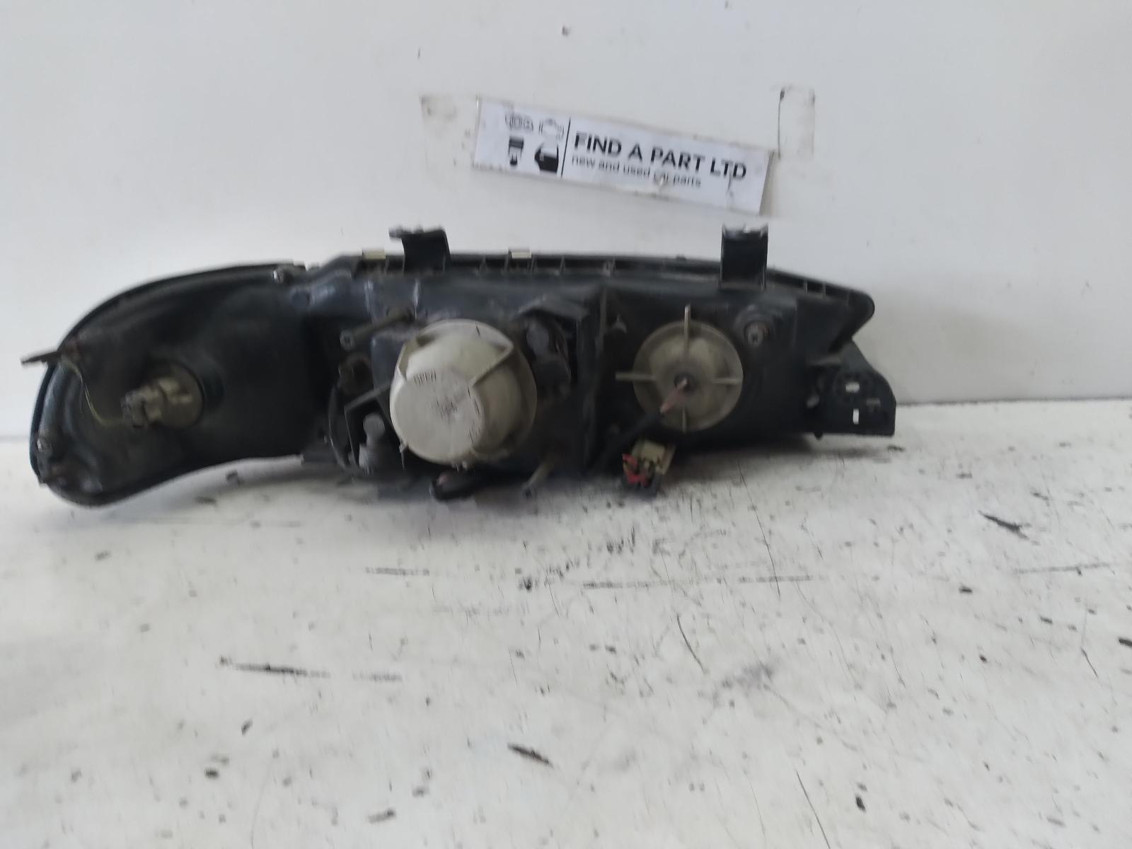 1996 SUBARU LIBERTY Left Headlamp Contact us for Photo