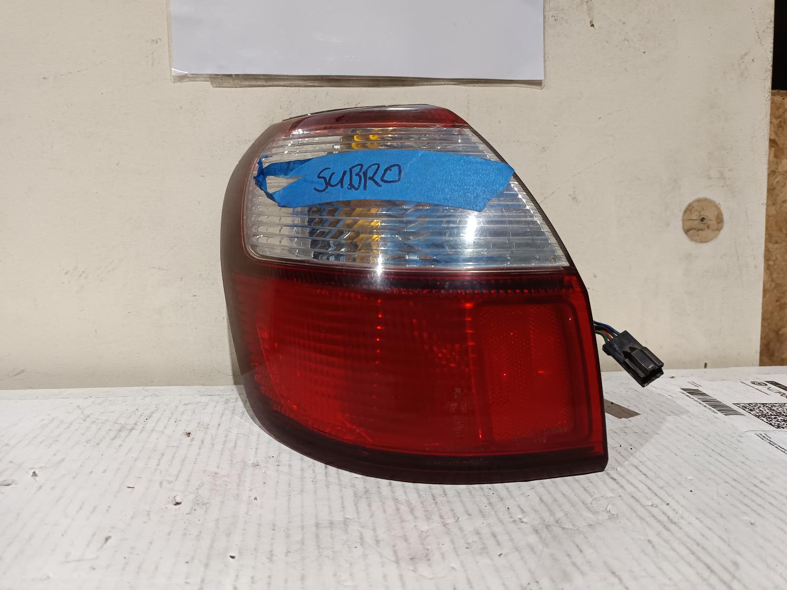 1999 SUBARU LIBERTY Left Taillight Contact us for Photo