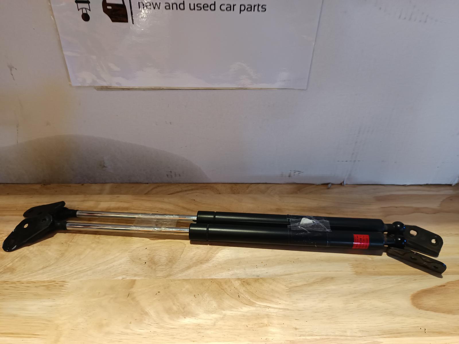 2001 TOYOTA CALDINA Hatch Strut Contact us for Photo