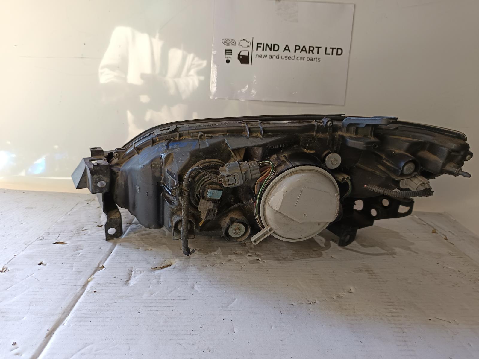 2006 SUBARU LIBERTY Right Headlamp Contact us for Photo