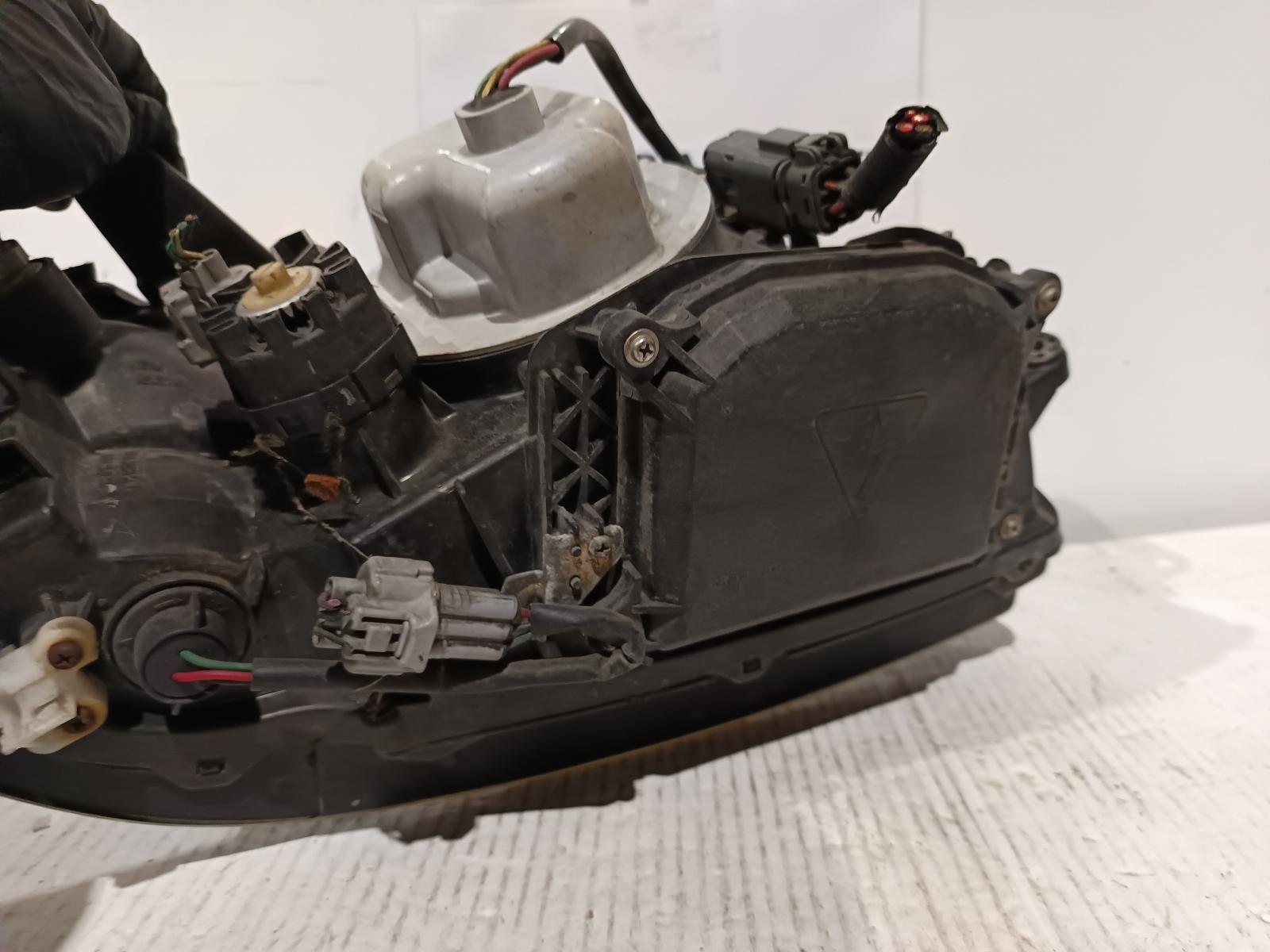 2001 SUBARU LIBERTY Left Headlamp Contact us for Photo
