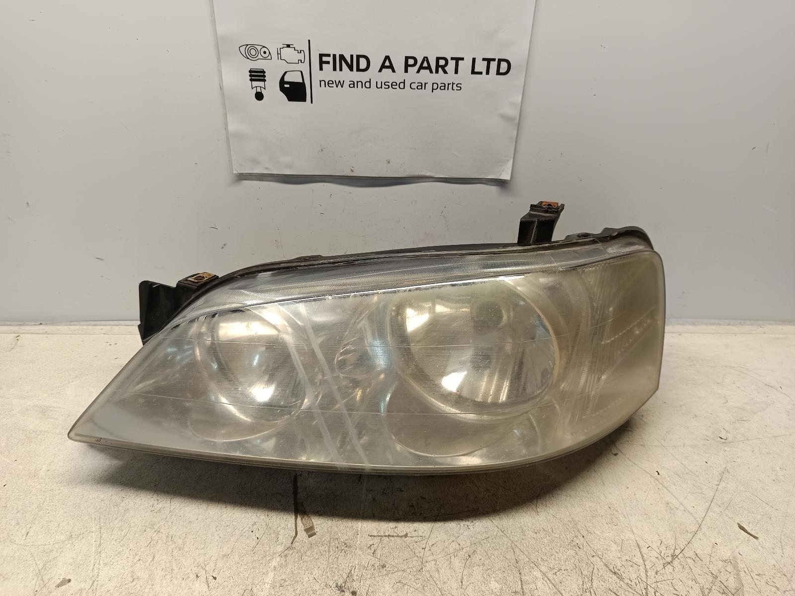 2004 FORD FALCON Left Headlamp Contact us for Photo