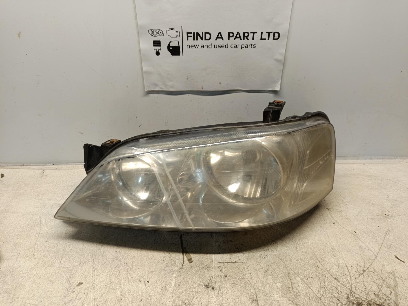 2004 FORD FALCON Left Headlamp Contact us for Photo