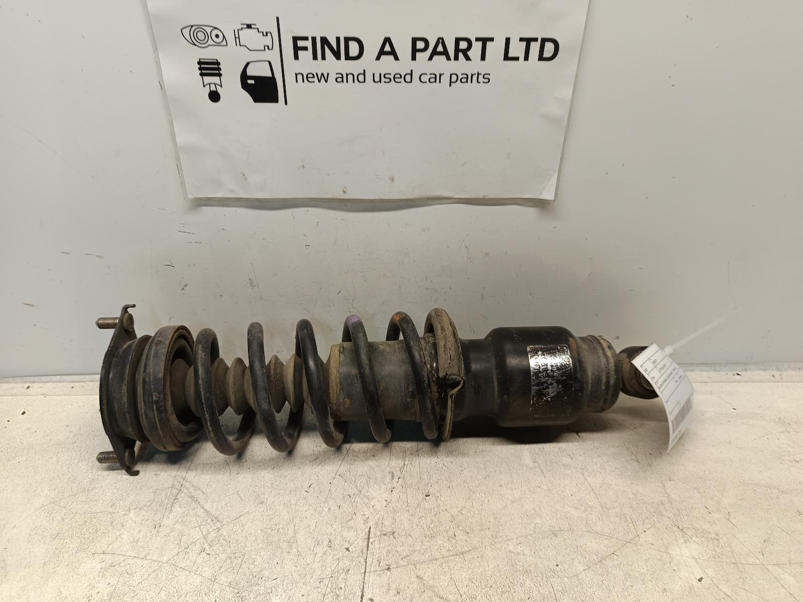View Auto part Left Rear Strut SUBARU LIBERTY 1998