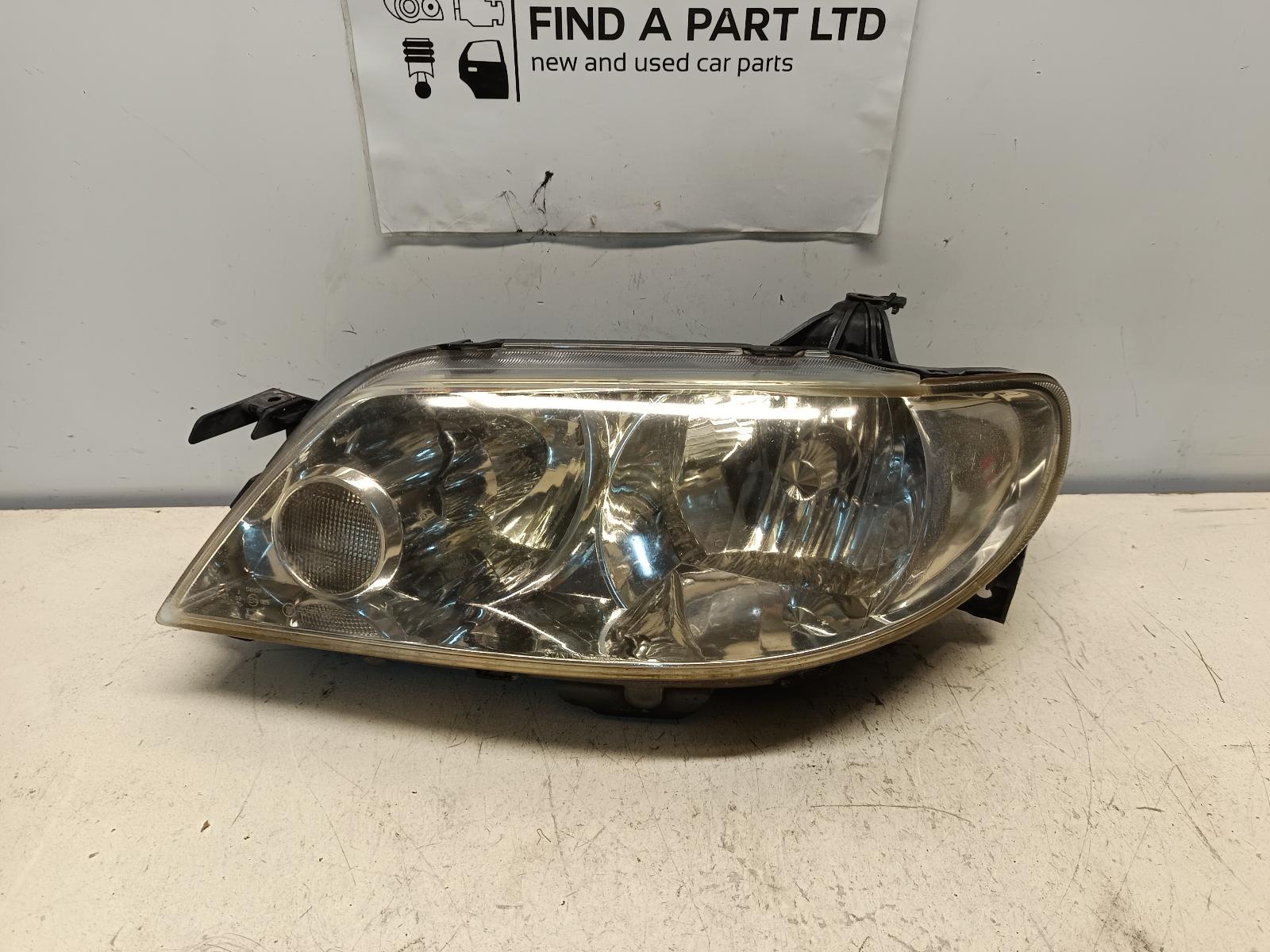 View Auto part Left Headlamp MAZDA 323 2003
