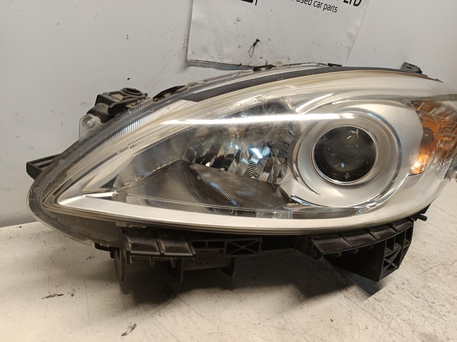 2010 MAZDA PREMACY Left Headlamp Contact us for Photo