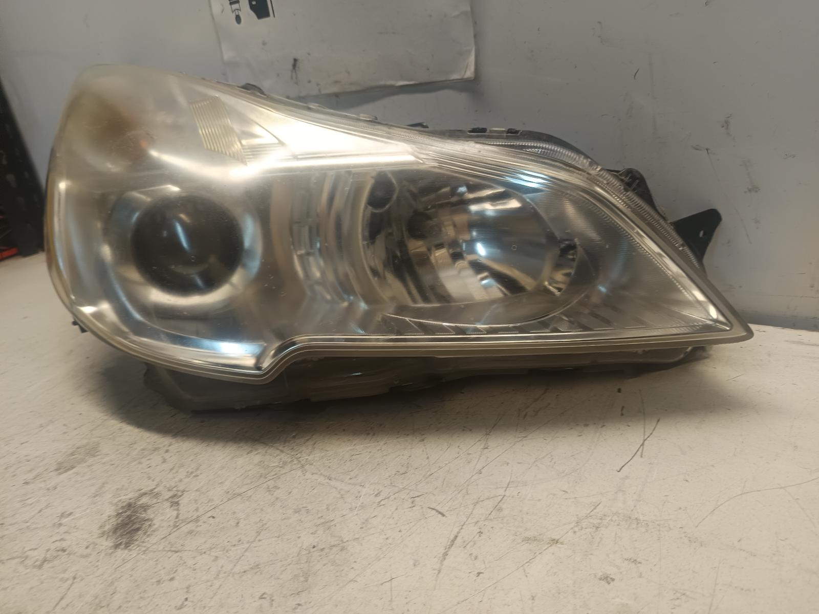 2011 SUBARU LIBERTY Right Headlamp Contact us for Photo
