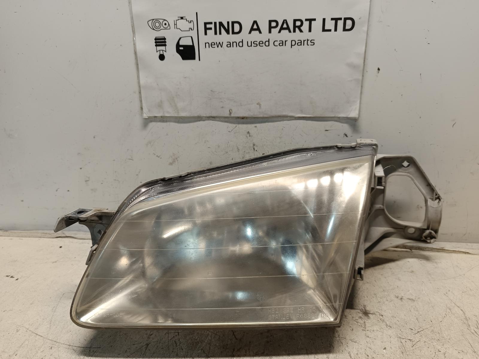 View Auto part Left Headlamp MAZDA 323 2000