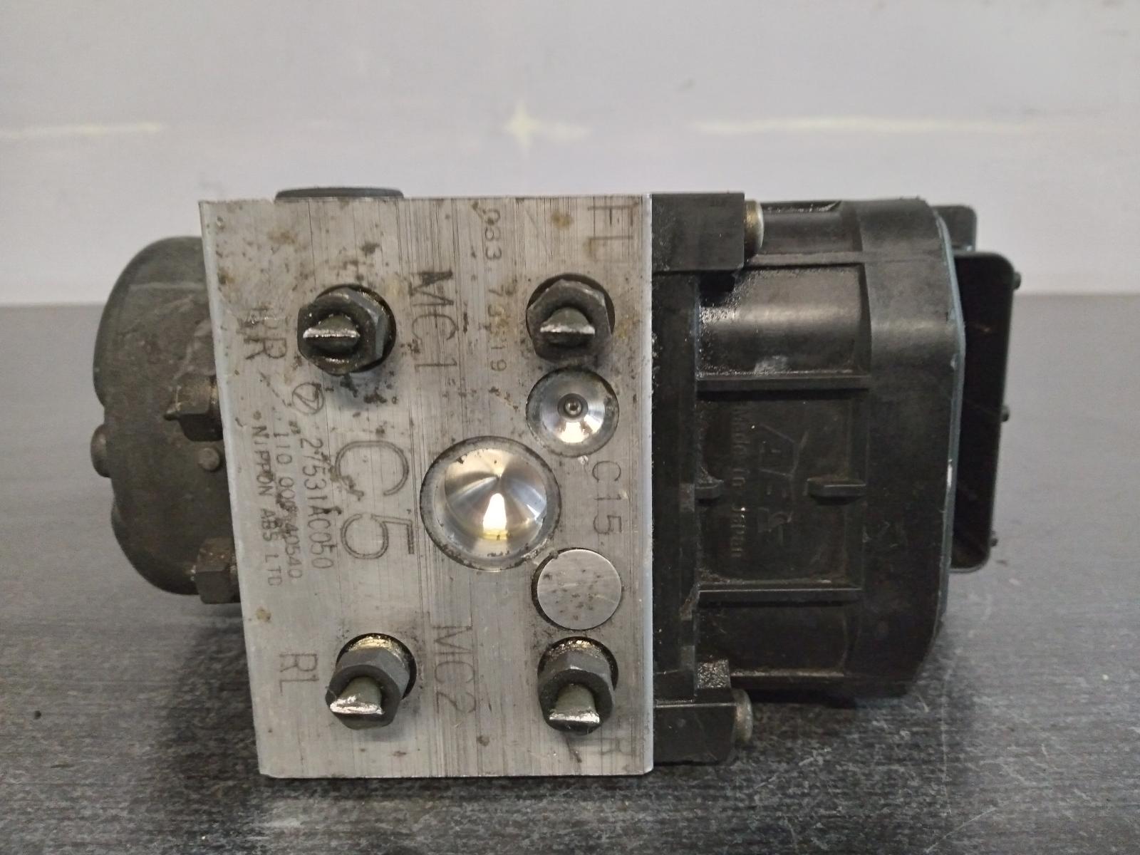 2000 SUBARU LIBERTY Abs Pump/Modulator Contact us for Photo