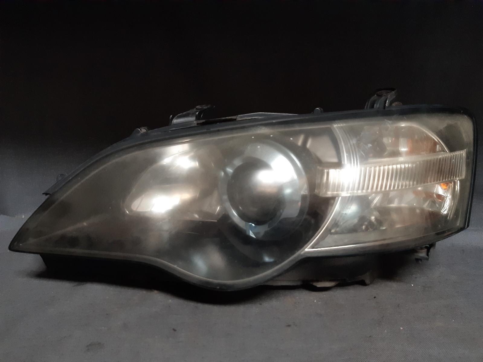 2004 SUBARU OUTBACK Left Headlamp Contact us for Photo