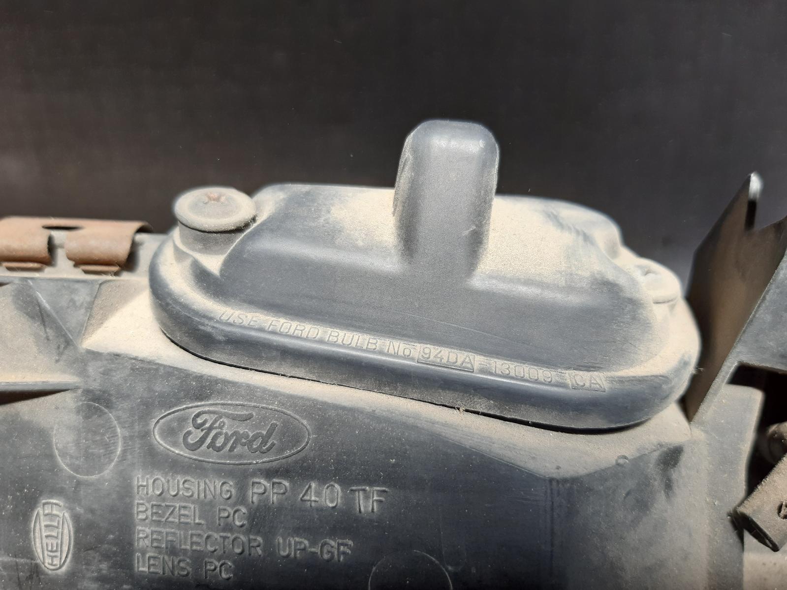 1995 FORD FALCON Left Headlamp Contact us for Photo