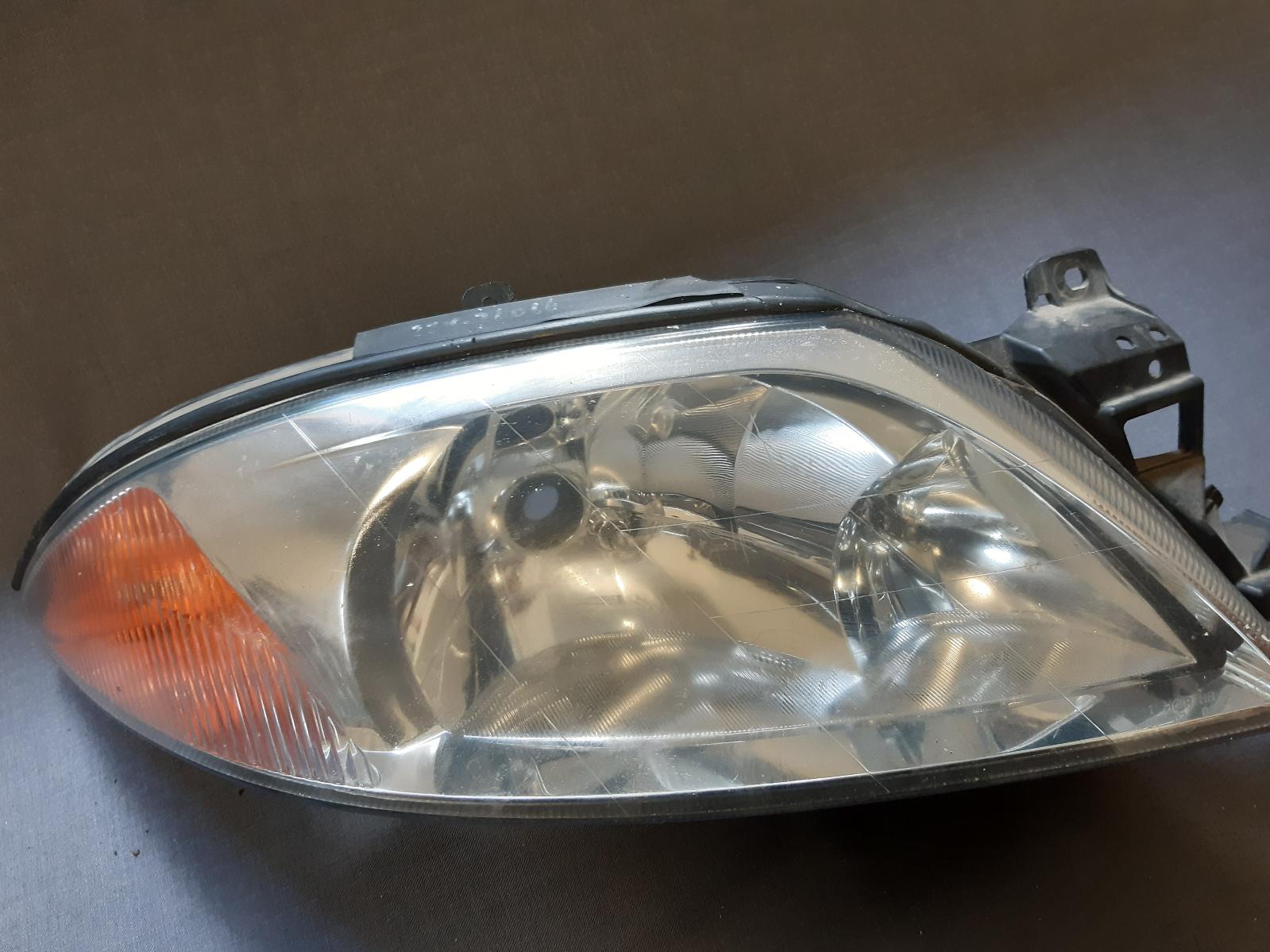 2001 FORD FALCON Right Headlamp Contact us for Photo