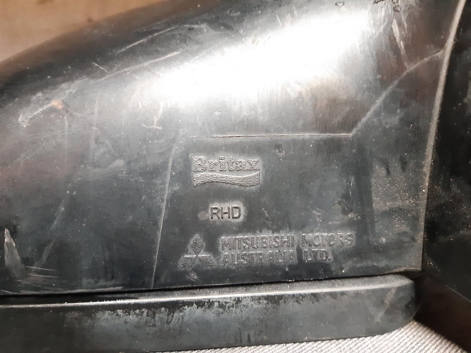 1998 MITSUBISHI MAGNA Right Door Mirror Contact us for Photo