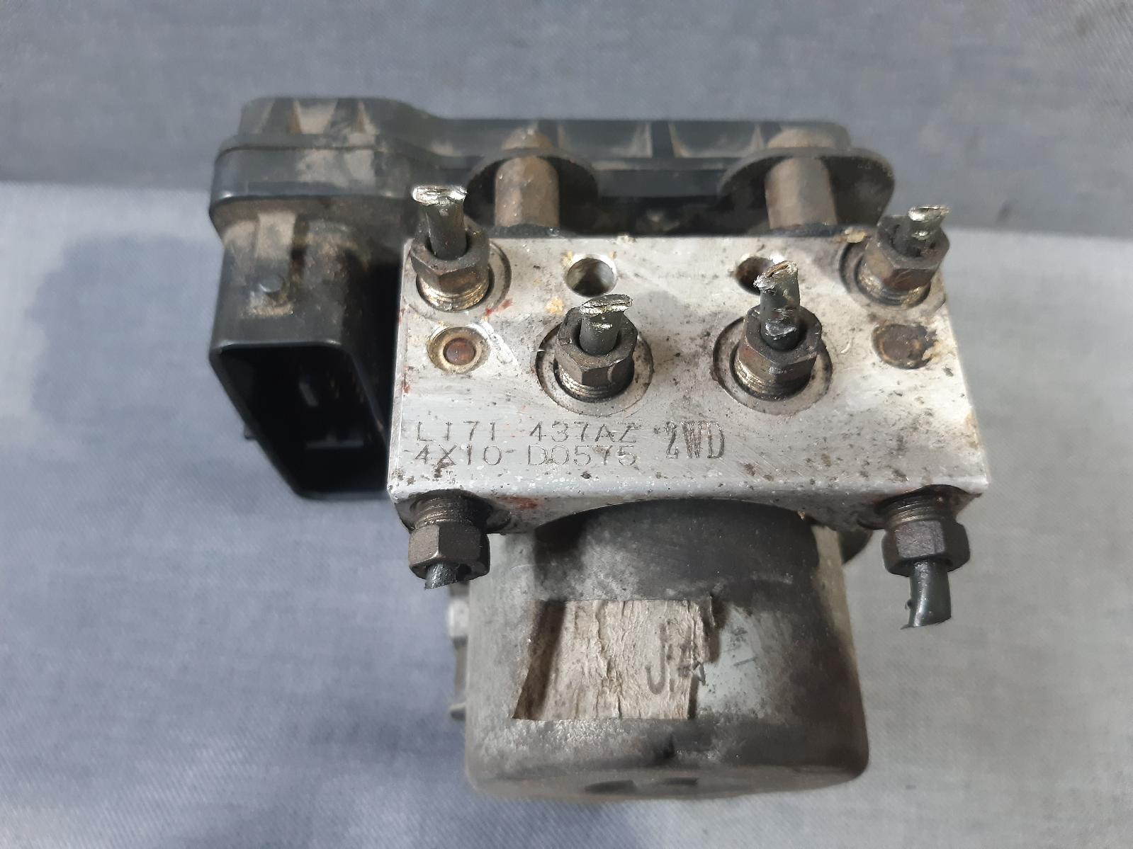 2006 MAZDA MPV Abs Pump/Modulator Contact us for Photo