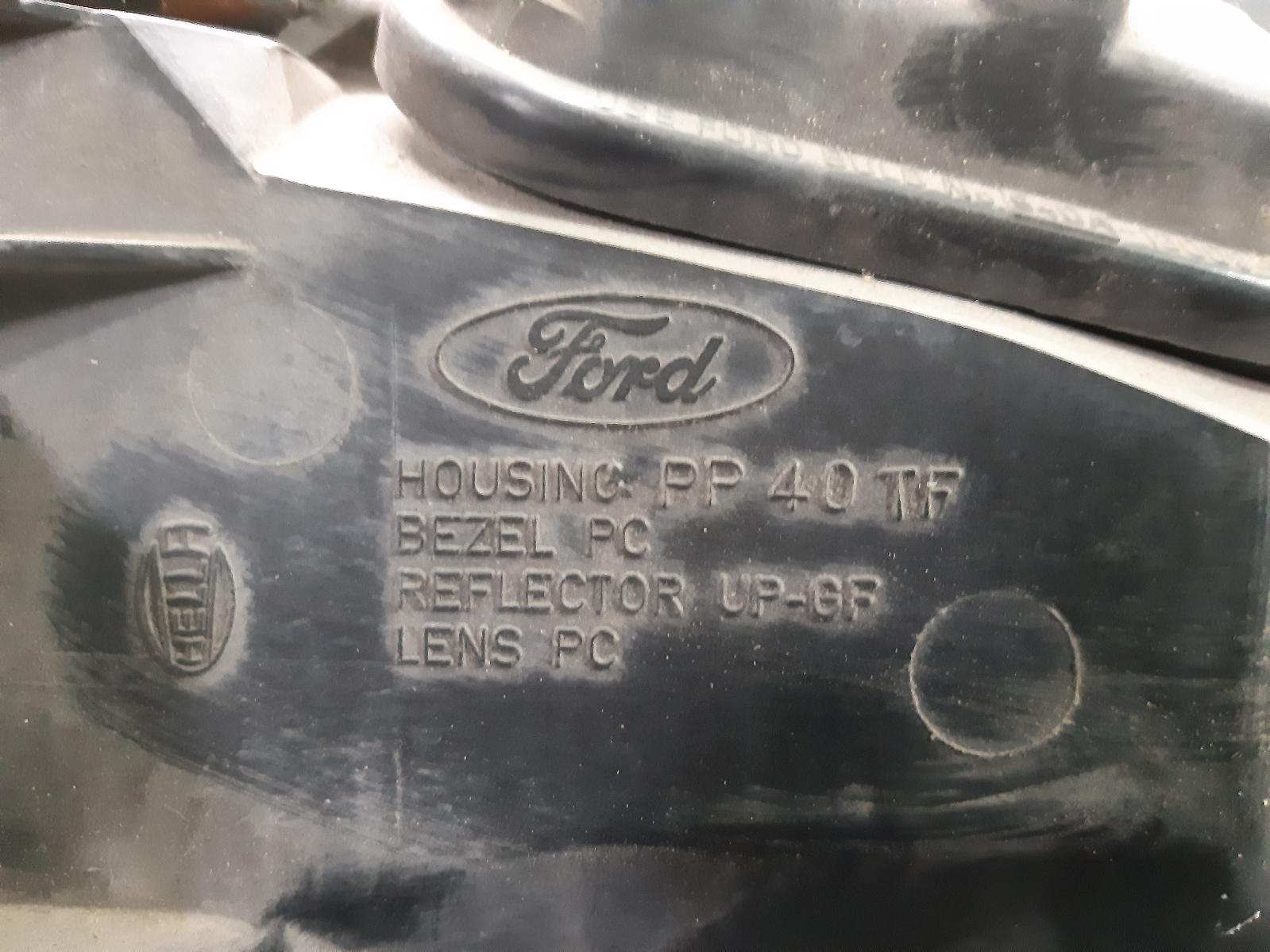 1996 FORD FALCON Left Headlamp Contact us for Photo