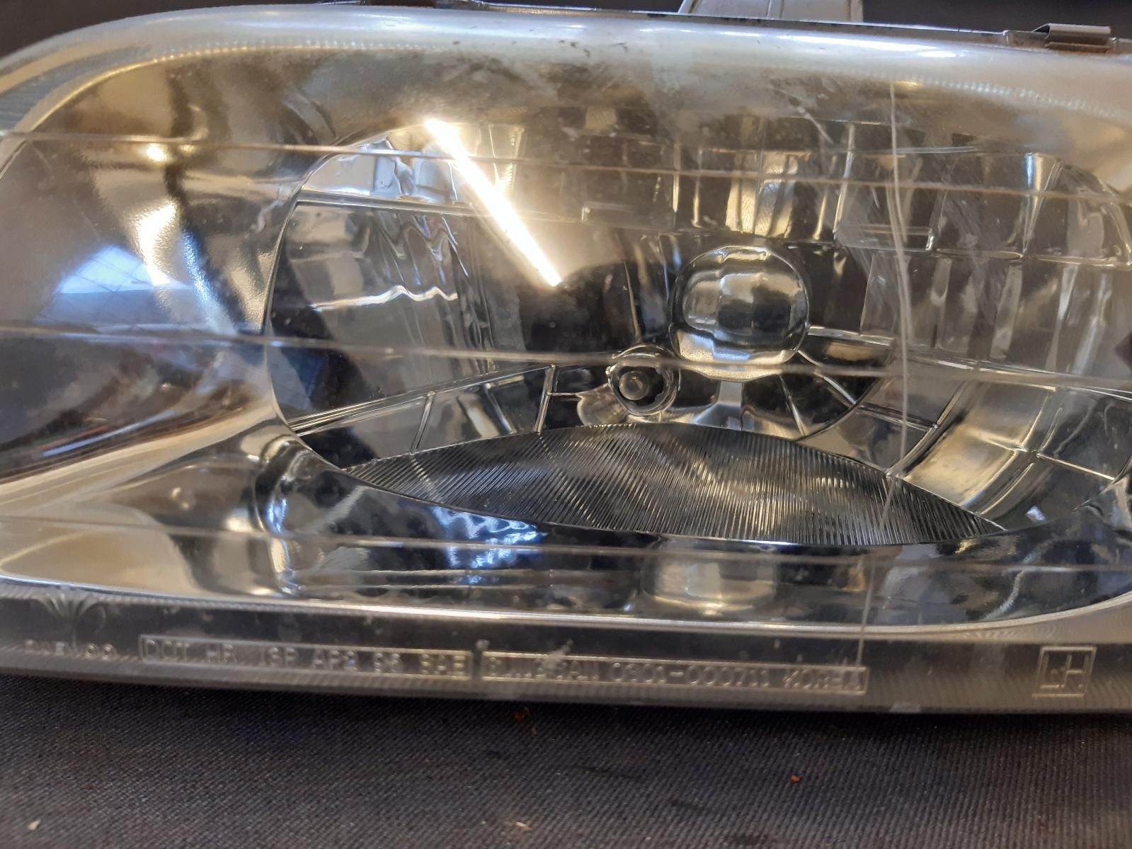 2000 DAEWOO NUBIRA Left Headlamp Contact us for Photo