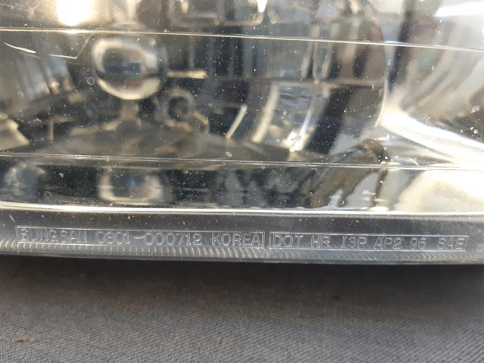 1998 DAEWOO NUBIRA Right Headlamp Contact us for Photo