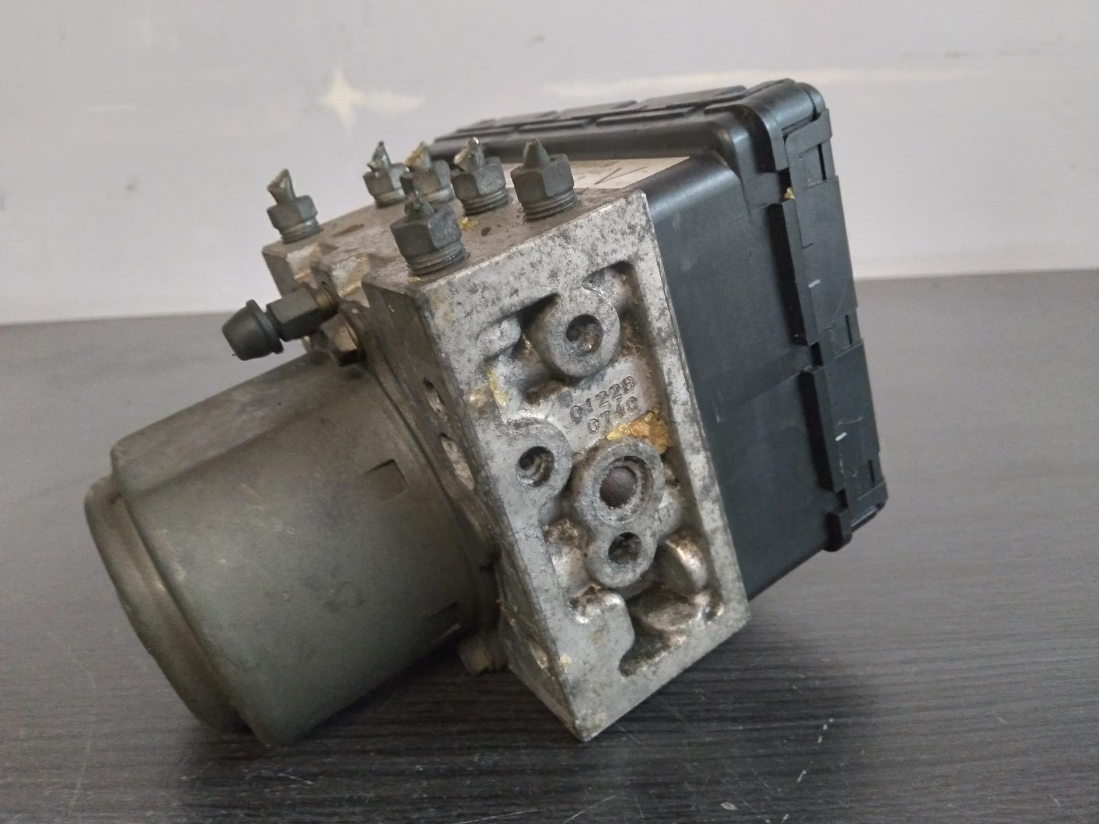2004 TOYOTA COROLLA Abs Pump/Modulator Contact us for Photo